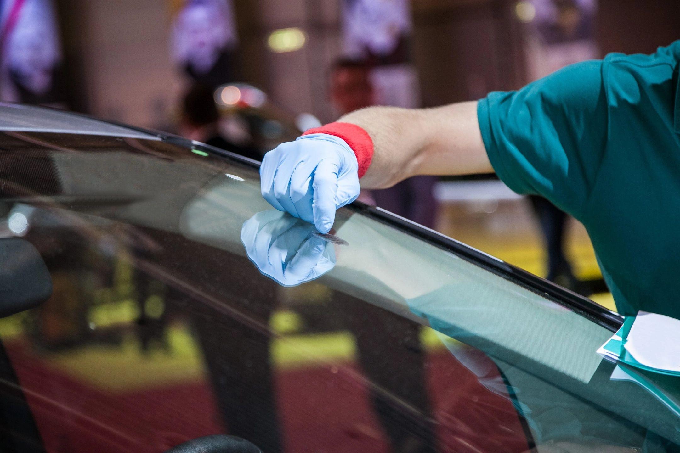 Vehicle with professionally tinted windows at Mr. Glassworks Arizona shop